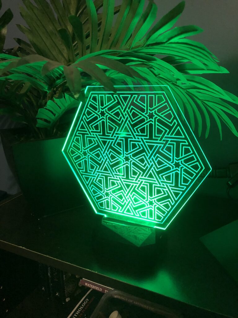 Green illuminated hexagonal acrylic lattice